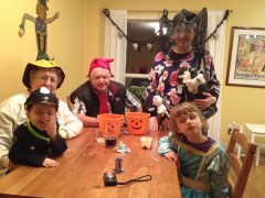 Everyone enjoying some time after trick or treating.