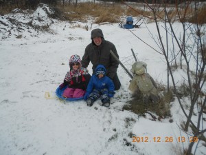 Peter, Abby & Aiden hanging out with the scarecrow.