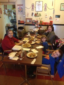 Aiden, Abby & Melissa eating at Sandra's restaurant.