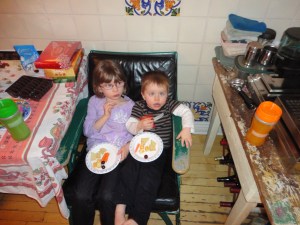 Kids eating their snacks on chair in Steven & Karen's Kitchen
