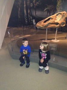 Abby & Aiden sitting and waiting to go to the next exhibit