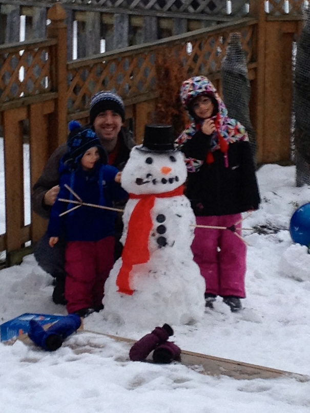 Dad, Abby & Aiden with first snowman of the season