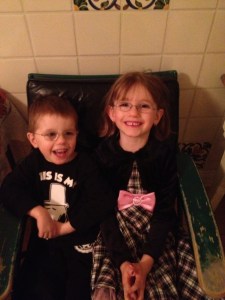 Kids sitting in kitchen waiting for some snacks