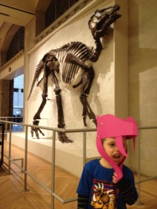 Aiden wearing his dinosaur mask that he made