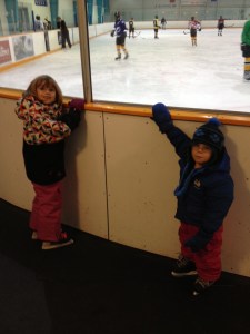 Abby & Aiden watching players practising before them