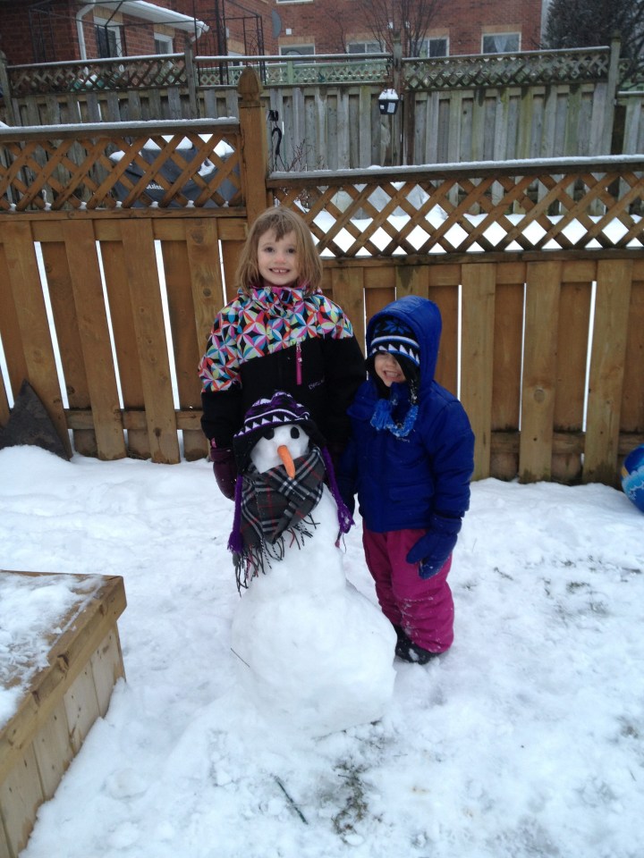 Abby & Aiden with their first round of decorating for the snowman