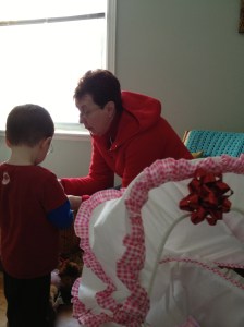 Aiden checking out what Grandma has.