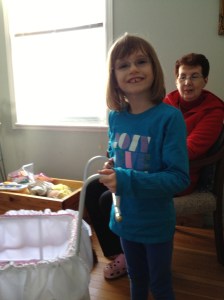 Abby with her Pram that Grandma got her for Christmas.