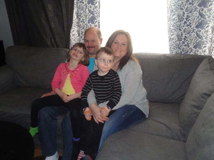 Abby & Aiden snuggling with their cousins