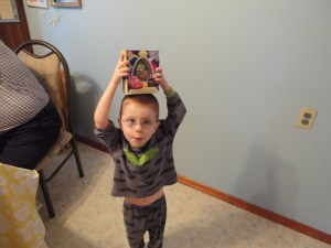 Aiden showing off his toy from the Easter bunny