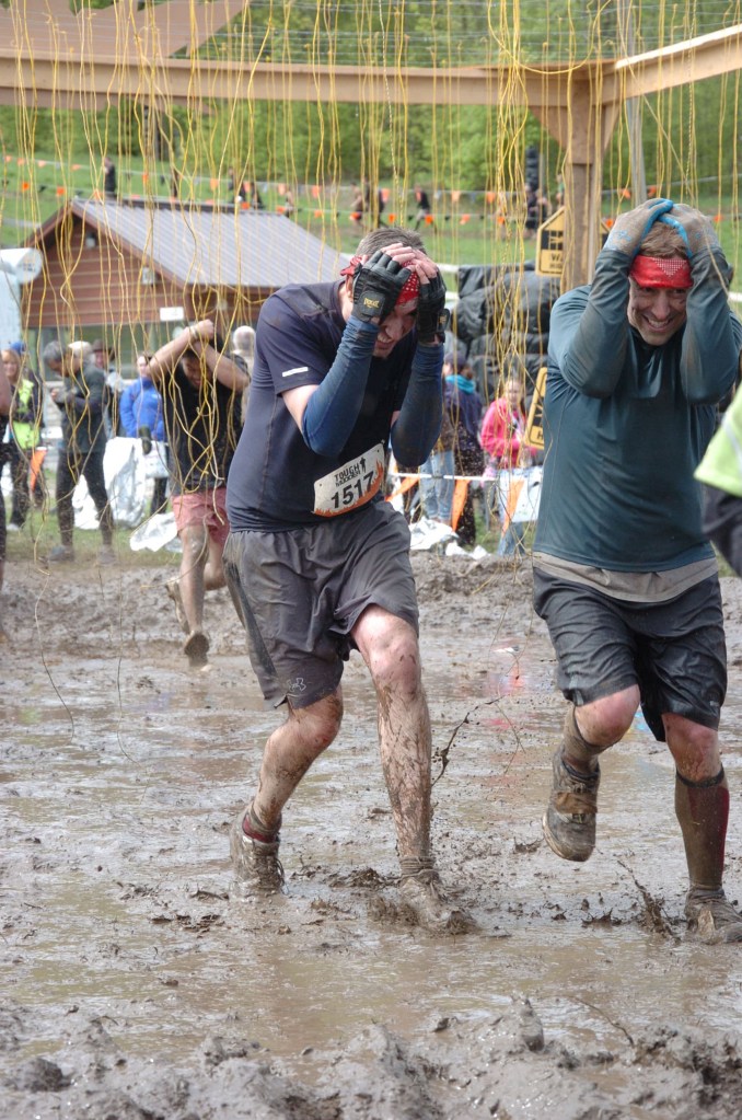 Peter & Brian running through last obstacle.
