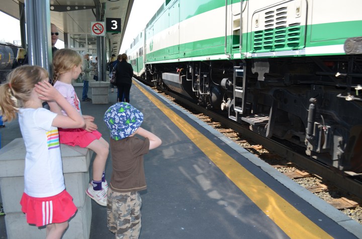 Abby and Willy covering their ears at the sound of the train