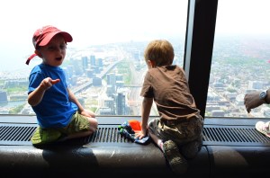 Aiden and Willy looking out from the top of the tower