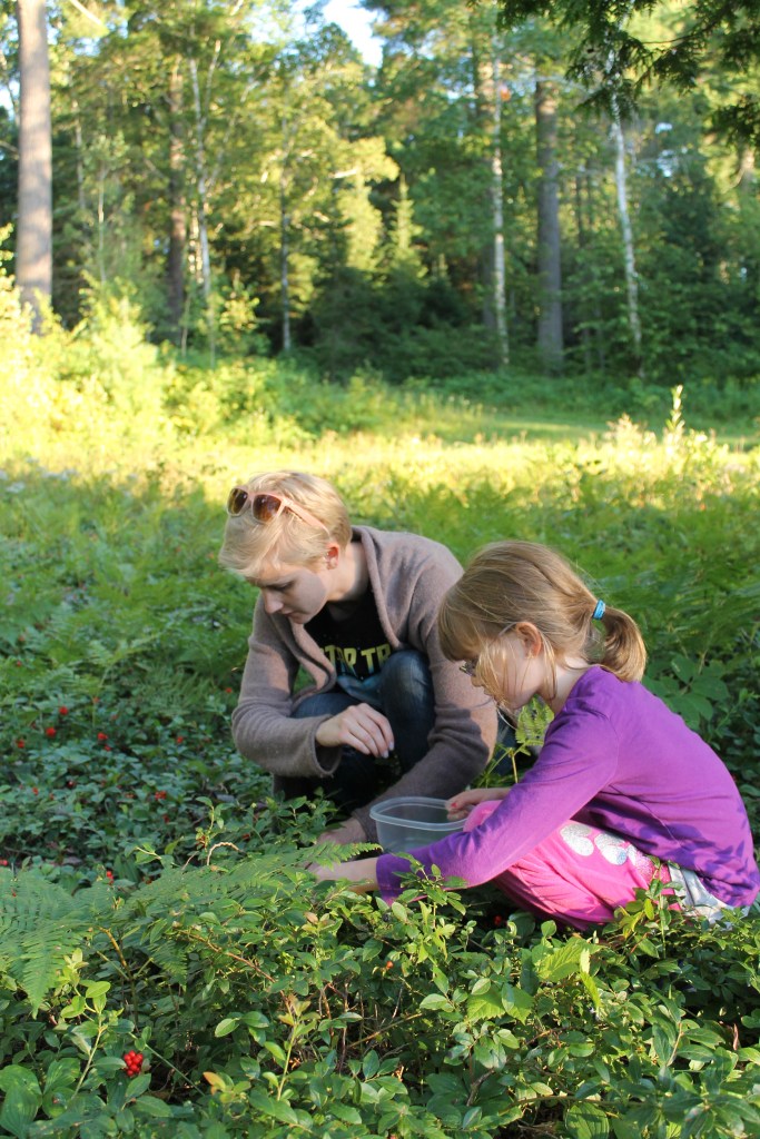 Shauna and Abby picking berries