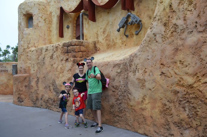 The family with their make believe lightsabers in Tatooine.