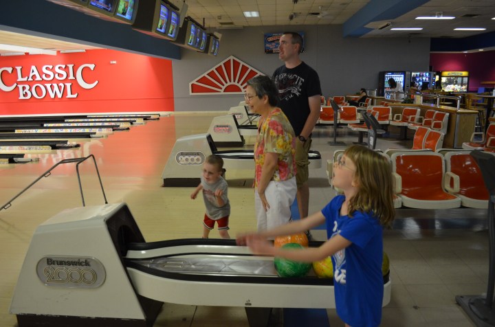 Abby, Aiden, Sandra and Peter getting ready to bowl