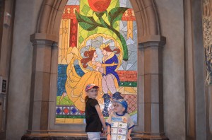 Abby and Aiden inside "Be Our Guest Restaurant"