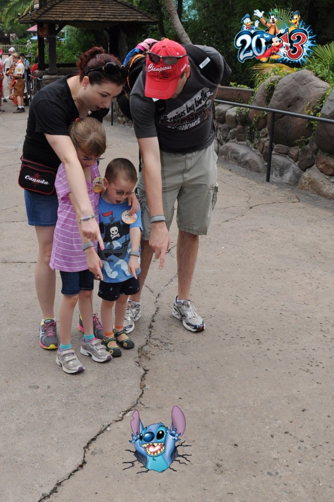 Stich coming through a crack in the ground at Animal Kingdom