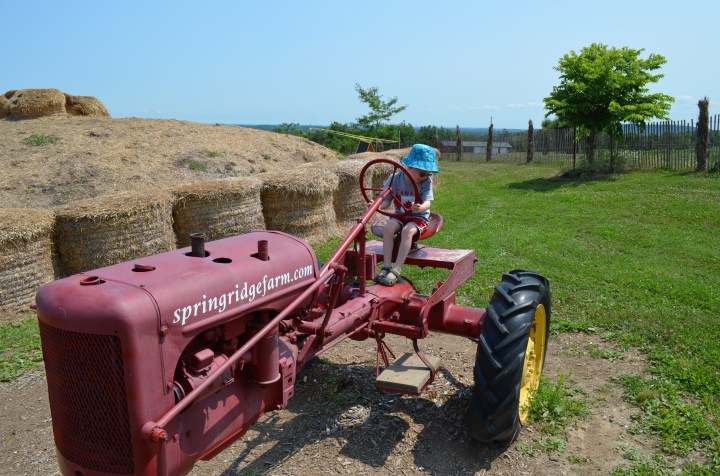 Aiden checking out the tractor