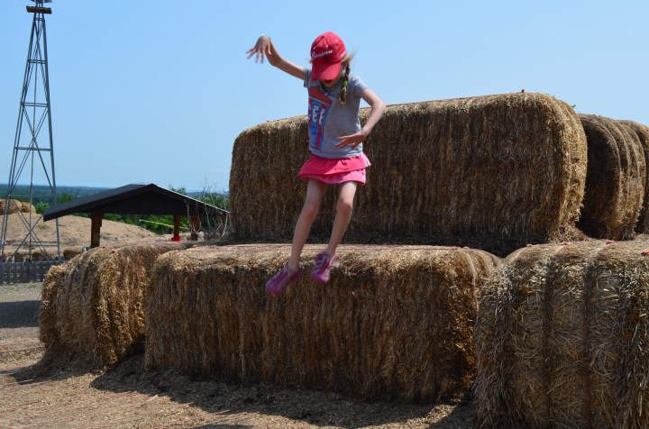 Abby jumping down from the Haystack.