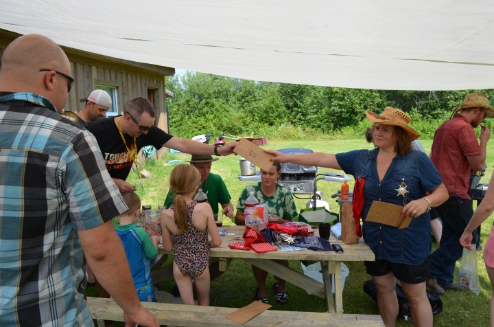 The kids buying stuff at the General Store