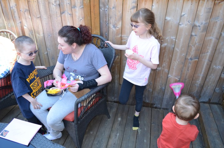 Mommy opening the kids Mother's Day Gifts