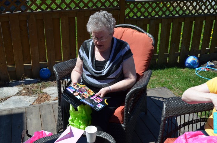 Mama opening her Mother's Day Gift