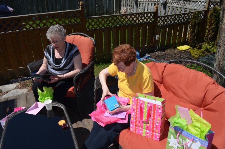 Mama and Grandma opening their gifts