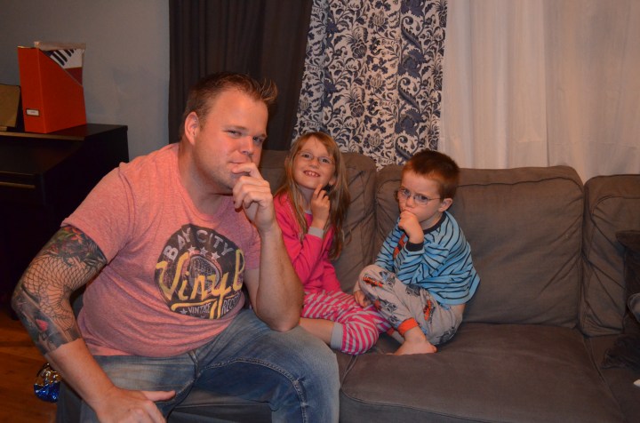 Uncle Jason, Abby and Aiden looking very serious.