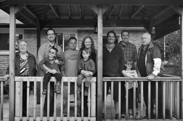 Ann, Rob with Aiden, Jason, Julie with Macklan, Peter A, Peter C with Abby in front and Bernard on the Allison's deck.