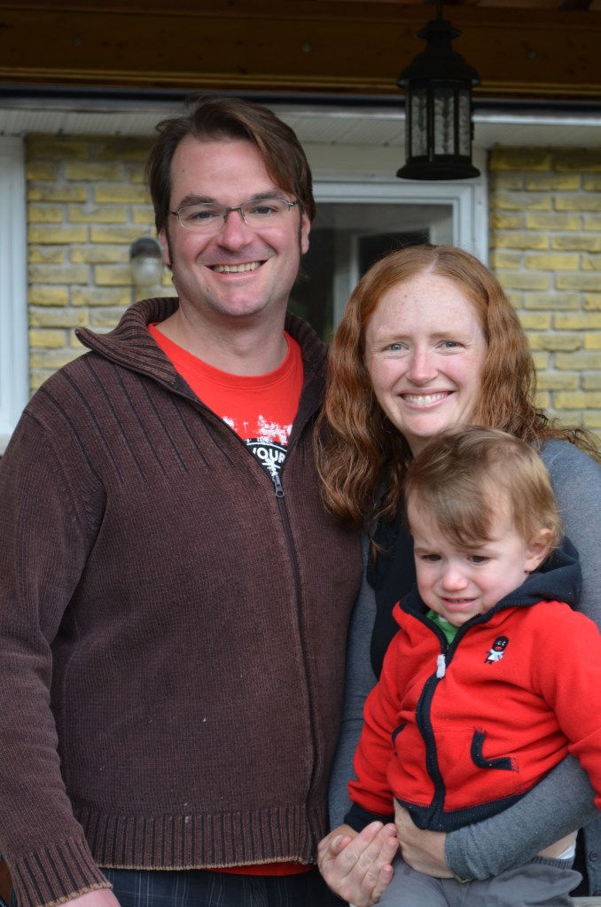 Peter and Julie with a very tired Macklan.