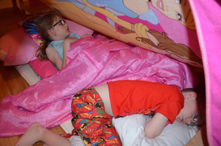Abby and Aiden sleeping in their fort.
