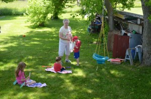 Abby and Macklan enjoy a freezie while Aiden check's Mama's supply!!!