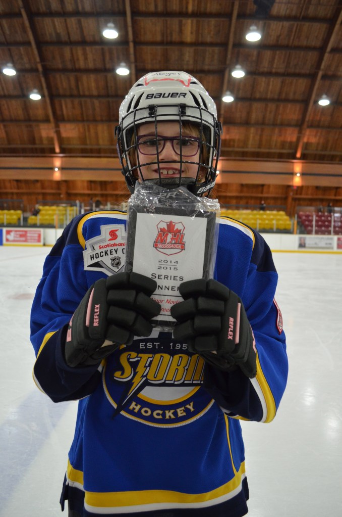 Abby with her season series champion plaque.