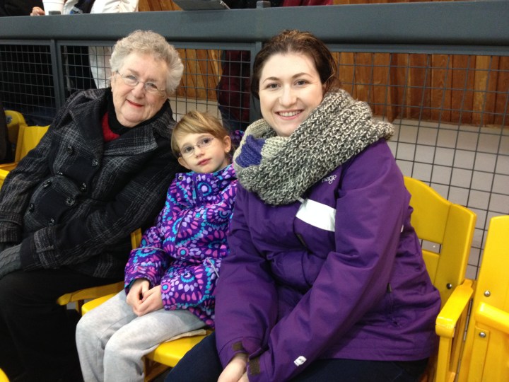 Mama, Abby and Melissa cheering Aiden on at an early morning game at Port Credit Arena.