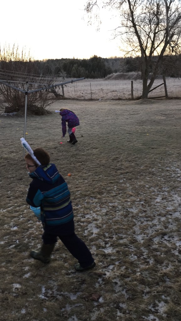 Aiden and Abby hunting for Easter Eggs